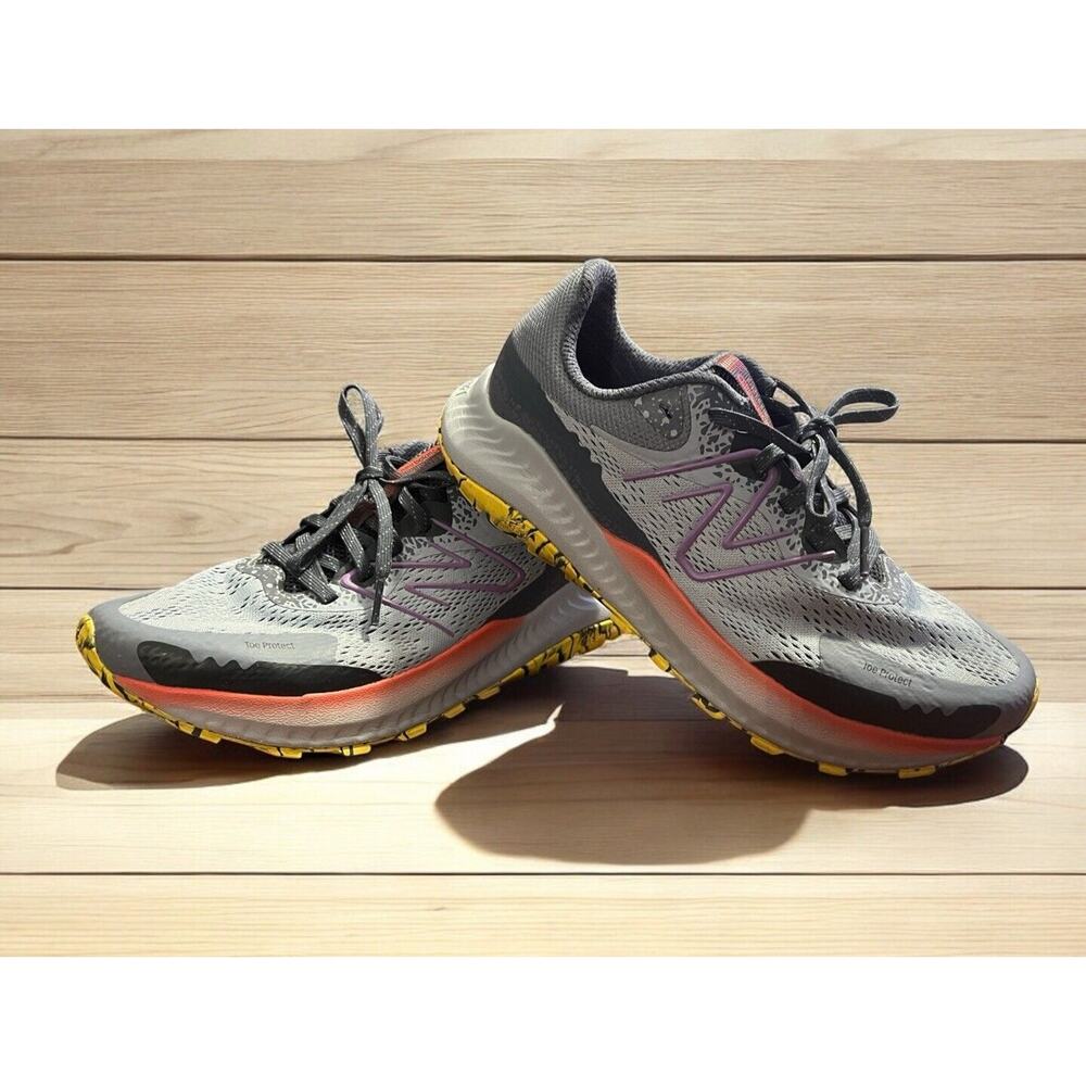 New Balance Gray Athletic Running Shoes with Yellow Accent
